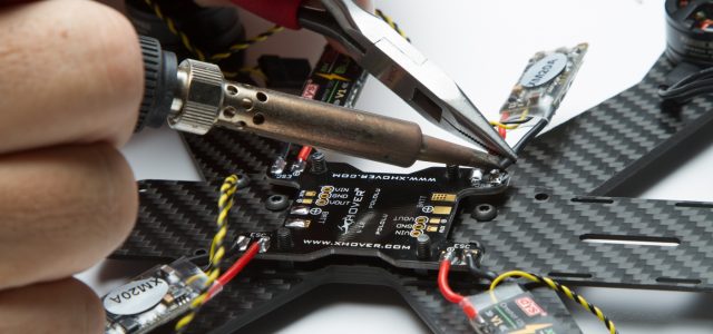 Soldering up a drone racer power board