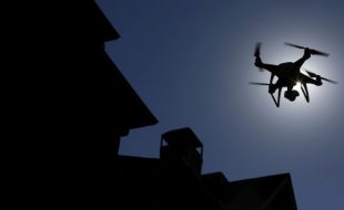 A Da-Jiang Innovations Science and Technology Co. (DJI) Phantom drone is flown during a property inspection following Hurricane Harvey in Houston, Texas, U.S. Photographer: Luke Sharrett/Bloomberg